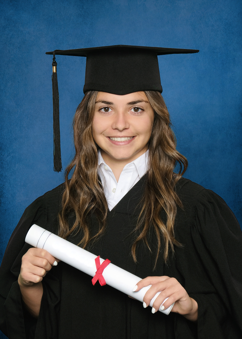 A high school graduate portrait taken by Studio NanC of a young girl wearing a black graduation cap and gown holding a diploma.