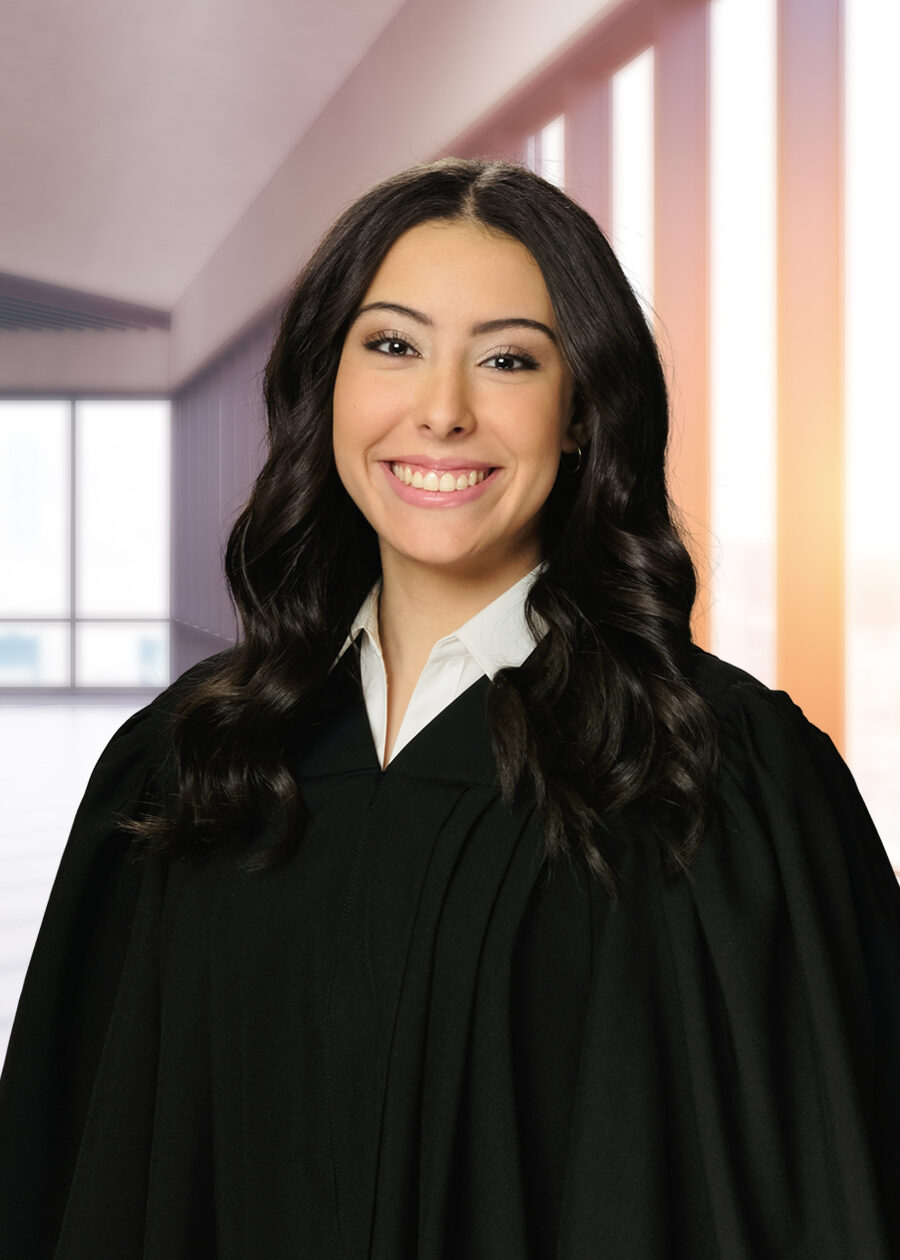 GradPase_Gown A high school graduation portrait of a girl wearing a graduation gown